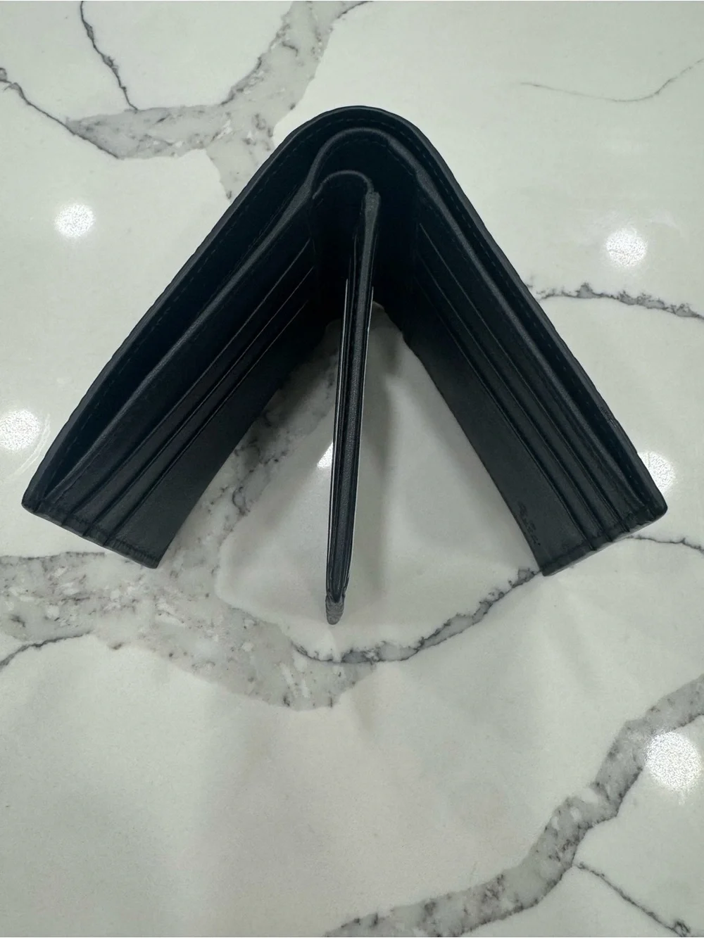 Gucci Black Embossed GG Leather Wallet